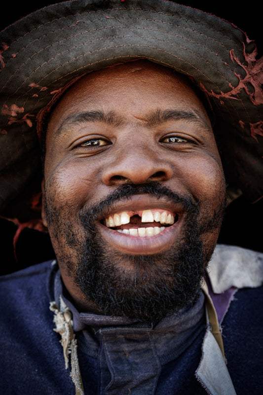 Emmanuel, 39 - Newspaper Vendor